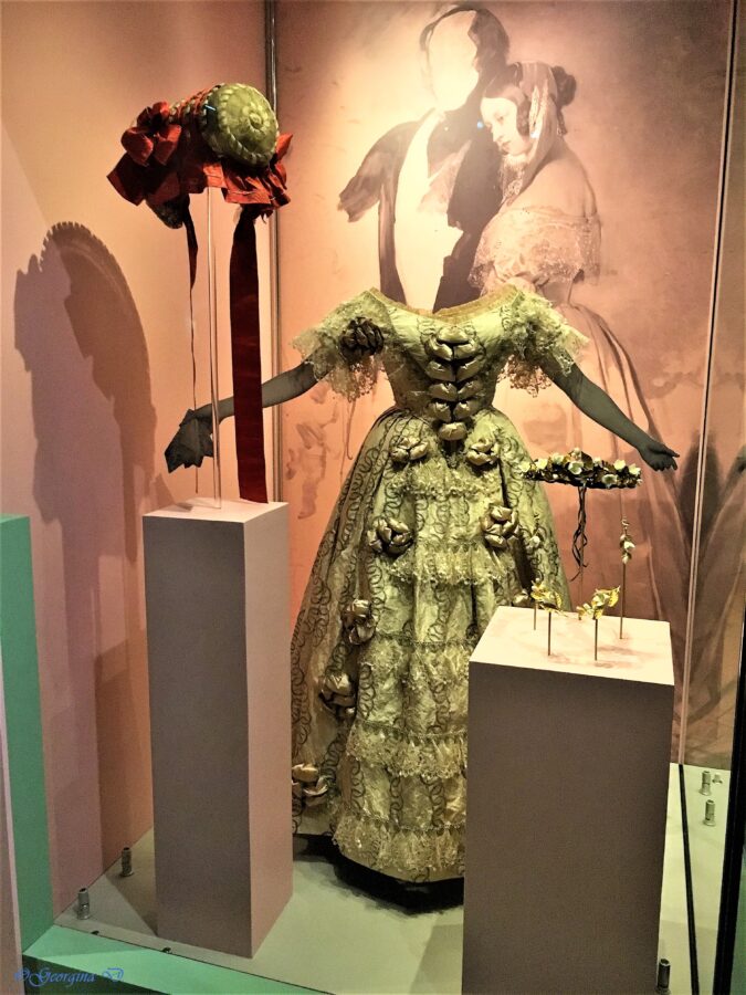 Queen Victoria’s dress, originally bright pink, displayed at Kensington Palace for the exhibition marking the 200th anniversary of her birth. Photo by Georgina.