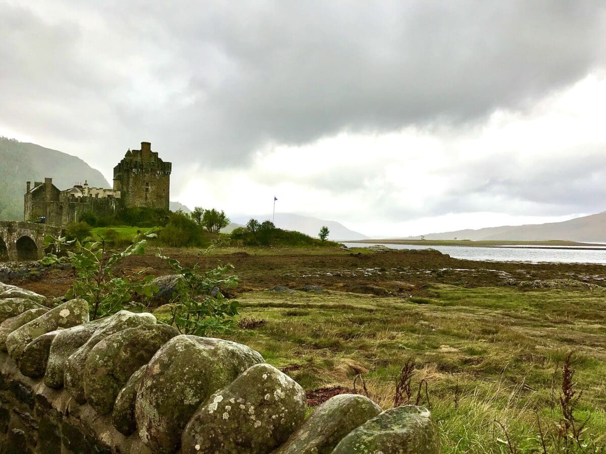 side view of Eilean Donan Castle on a misty moody morning