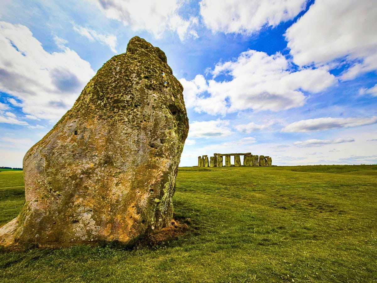 Distant view of Stonehenge on Salisbury Plain, highlighting the vast open landscape surrounding the ancient monument.