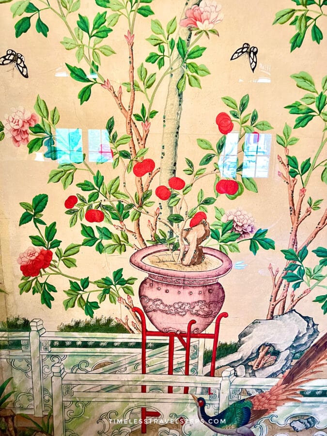 Chinese-inspired wallpaper depicting bamboo and cherry blossom in the upper rooms of the Royal Pavilion in Brighton.