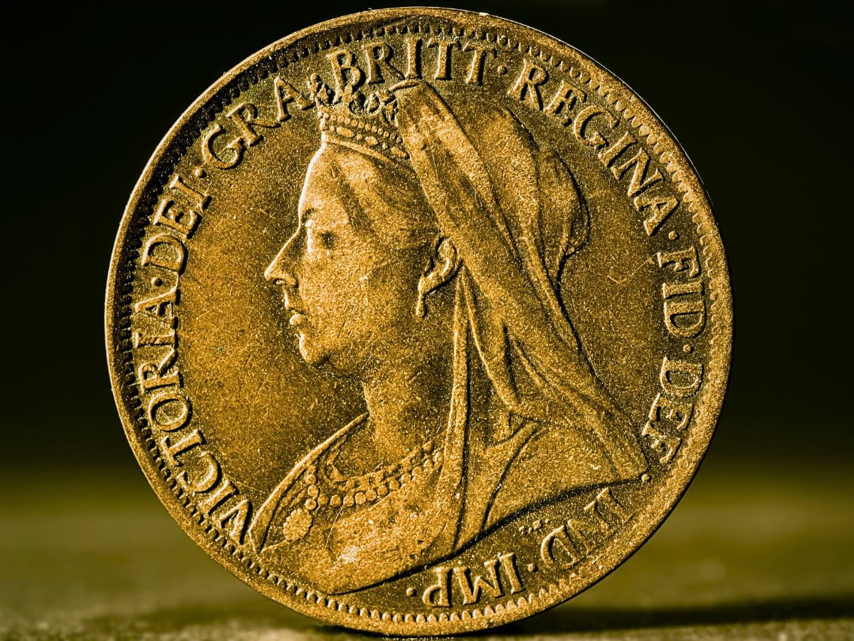 Antique British one-penny coin from the Victorian era featuring a profile portrait of Queen Victoria