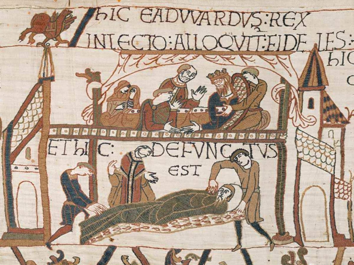 Edith of Wessex sits at the feet of the dying Edward the Confessor in an eleventh-century scene from the Bayeux Tapestry.