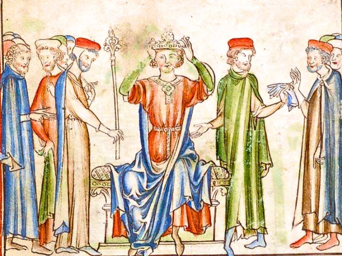 Mid-thirteenth-century manuscript illustration of Harold Godwinson placing the English crown on his own head after Edward the Confessor’s death.